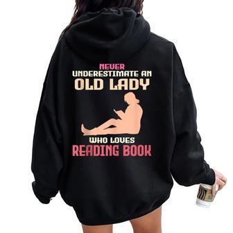 Never Underestimate An Old Lady Who Loves Reading Book Women Oversized Hoodie Back Print - Monsterry UK