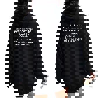 Never Underestimate An Old Lady Who Loves Reading Women Oversized Hoodie Back Print - Seseable