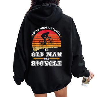 Never Underestimate An Old Man On A Bicycle Retired Cyclist Women Oversized Hoodie Back Print - Seseable