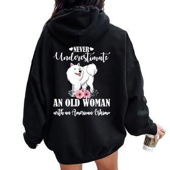 Never Underestimate An Old Woman With American Eskimo Women Oversized Hoodie Back Print - Monsterry