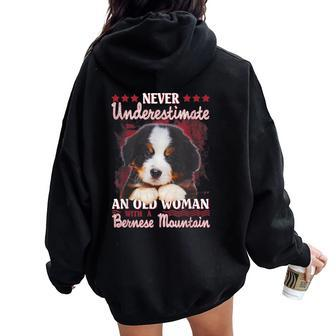 Never Underestimate An Old Woman With A Bernese Mountain Women Oversized Hoodie Back Print | Mazezy