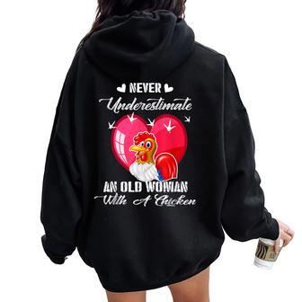 Never Underestimate An Old Woman With A Chicken Costume Women Oversized Hoodie Back Print - Monsterry