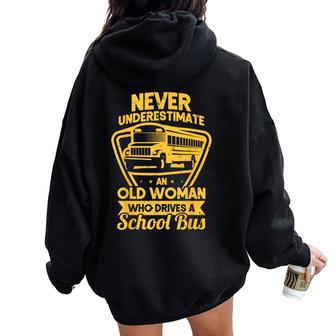 Never Underestimate Old Woman Who Drive A School Bus Driver Women Oversized Hoodie Back Print | Mazezy