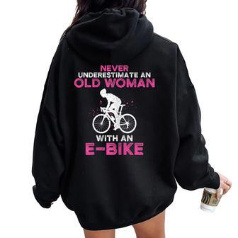 Never Underestimate An Old Woman With An E-Bike Bike Women Oversized Hoodie Back Print | Mazezy