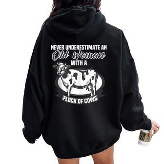 Never Underestimate An Old Woman With A Flock Of Cows Women Oversized Hoodie Back Print - Monsterry