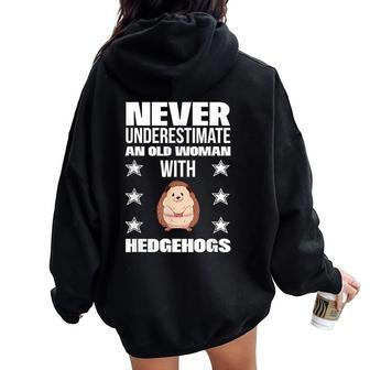 Never Underestimate An Old Woman With Hedgehogs Women Oversized Hoodie Back Print - Monsterry UK