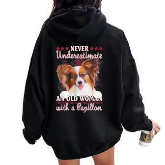 Never Underestimate An Old Woman With A Papillon Women Oversized Hoodie Back Print | Mazezy
