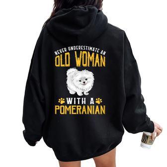 Never Underestimate An Old Woman With A Pomeranian Cute Women Oversized Hoodie Back Print - Thegiftio UK
