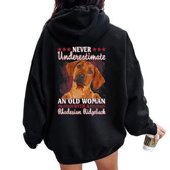 Never Underestimate An Old Woman With A Rhodesian Ridgeback Women Oversized Hoodie Back Print | Mazezy