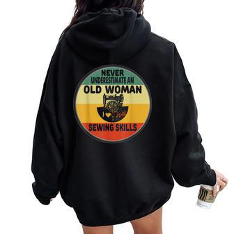 Never Underestimate An Old Woman With Sewing Skills Women Women Oversized Hoodie Back Print - Thegiftio UK