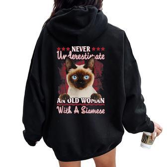 Never Underestimate An Old Woman With A Siamese Women Oversized Hoodie Back Print | Mazezy