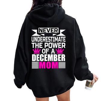 Never Underestimate The Power Of A December Mom Women Oversized Hoodie Back Print - Seseable