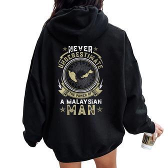 Never Underestimate The Power Of A Malaysian Man Women Oversized Hoodie Back Print | Mazezy