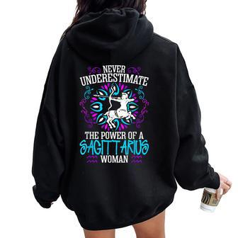 Never Underestimate The Power Of A Sagittarius Woman Women Oversized Hoodie Back Print | Mazezy