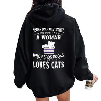Never Underestimate The Power Of A Woman With A Book Reading Women Oversized Hoodie Back Print | Mazezy