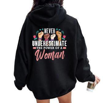 Never Underestimate The Power Of A Woman Feminism Women Oversized Hoodie Back Print | Mazezy