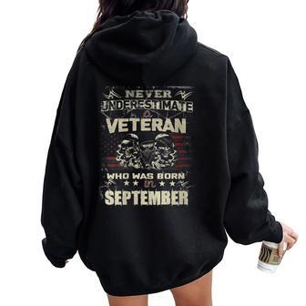 Never Underestimate A Veteran Who Was Born In September Women Oversized Hoodie Back Print | Mazezy