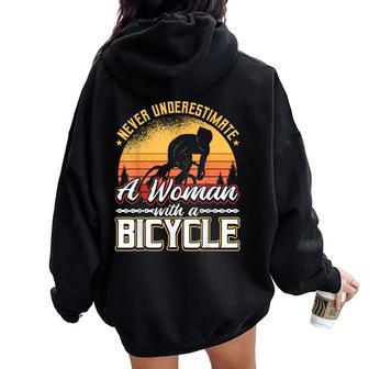 Never Underestimate A Woman With A Bicycle Women Oversized Hoodie Back Print - Monsterry
