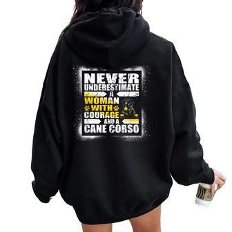 Never Underestimate Woman Courage And A Cane Corso Women Oversized Hoodie Back Print - Monsterry DE