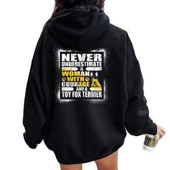 Never Underestimate Woman Courage And A Toy Fox Terrier Women Oversized Hoodie Back Print - Thegiftio UK