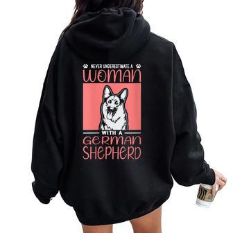 Never Underestimate A Woman With A German Shepherd Dog Women Oversized Hoodie Back Print - Thegiftio UK