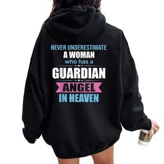Never Underestimate A Woman Who Has A Guardian Angel Women Oversized Hoodie Back Print | Mazezy