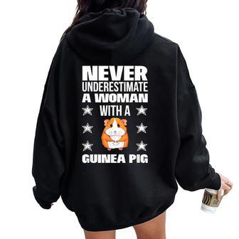 Never Underestimate A Woman With A Guinea Pig Women Oversized Hoodie Back Print - Monsterry AU