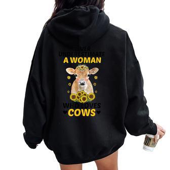 Never Underestimate A Woman Who Loves Cows Farming Lover Women Oversized Hoodie Back Print - Seseable