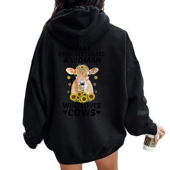 Never Underestimate A Woman Who Loves Cows Women Oversized Hoodie Back Print | Mazezy