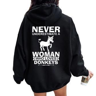 Never Underestimate A Woman Who Loves Donkeys Women Oversized Hoodie Back Print | Mazezy