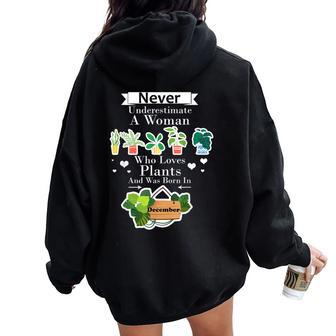 Never Underestimate A Woman Who Loves Plants December Women Oversized Hoodie Back Print | Mazezy
