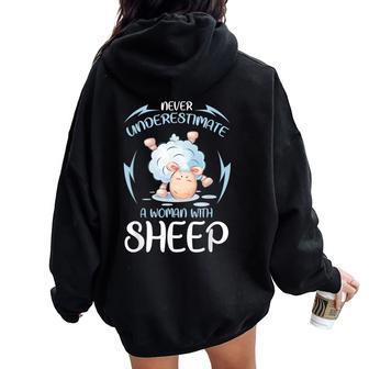 Never Underestimate A Woman With Sheep Shepherd Sheep Women Oversized Hoodie Back Print - Thegiftio UK