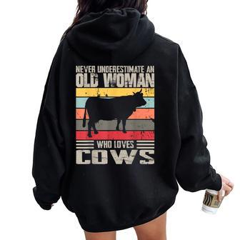 Vintage Never Underestimate An Old Woman Who Loves Cows Cute Women Oversized Hoodie Back Print - Seseable