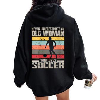 Vintage Never Underestimate An Old Woman Who Loves Soccer Women Oversized Hoodie Back Print - Seseable