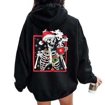 Christmas Skeleton With Smiling Skull Drinking Coffee Latte Women Oversized Hoodie Back Print | Mazezy