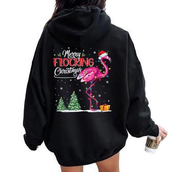 Merry Flocking Christmas Flamingo Pink In Santa Hat Xmas Gif Women Oversized Hoodie Back Print - Monsterry