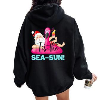 Santa Claus Flamingo Float Tis The Sea-Sun Christmas In July Women Oversized Hoodie Back Print - Monsterry