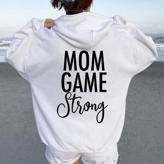 Mom Game Strong Uplifting Parenting Mother Slogan Women Oversized Hoodie Back Print | Mazezy