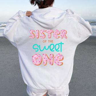 Sister Of Sweet One 1St First Birthday Matching Family Donut Women Oversized Hoodie Back Print | Mazezy