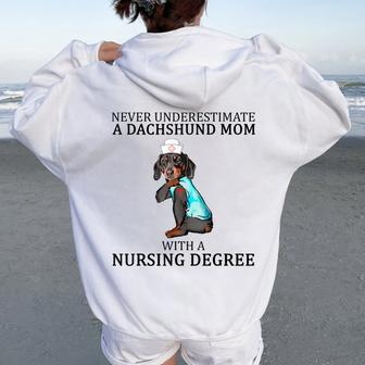 Never Underestimate A Dachshund Mom With A Nursing Degree Women Oversized Hoodie Back Print | Mazezy
