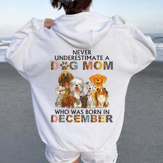 Never Underestimate A Dog Mom Who Was Born In December Women Oversized Hoodie Back Print - Seseable