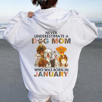 Never Underestimate A Dog Mom Who Was Born In January Women Oversized Hoodie Back Print - Seseable