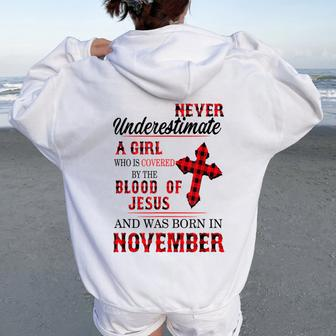 Never Underestimate A Girl Blood Of Jesus November Women Oversized Hoodie Back Print - Monsterry AU