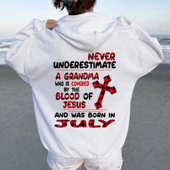 Never Underestimate A Grandma Blood Of Jesus July Women Oversized Hoodie Back Print - Seseable
