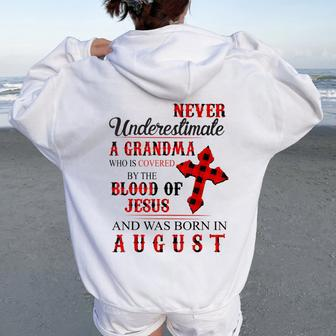 Never Underestimate A Grandma Who Is Covered Jesus In August Women Oversized Hoodie Back Print | Mazezy
