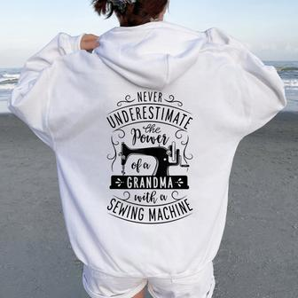 Never Underestimate Grandma With A Sewing Machine Mothers Women Oversized Hoodie Back Print - Monsterry