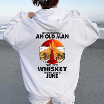 Never Underestimate An Old June Man Who Loves Whiskey Women Oversized Hoodie Back Print - Seseable