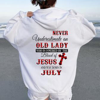 Never Underestimate An Old Lady Love Jesus Born In July Women Oversized Hoodie Back Print | Mazezy
