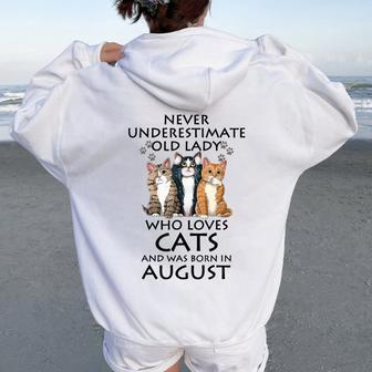 Never Underestimate Old Lady Who Loves Cat Born In August Women Oversized Hoodie Back Print | Mazezy