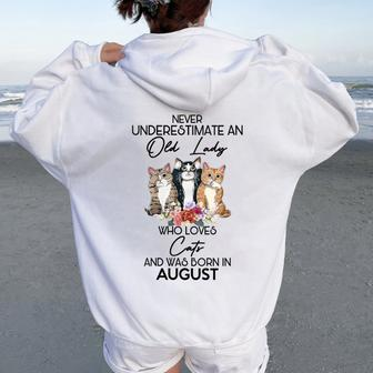 Never Underestimate An Old Lady Who Loves Cats August Women Oversized Hoodie Back Print - Seseable